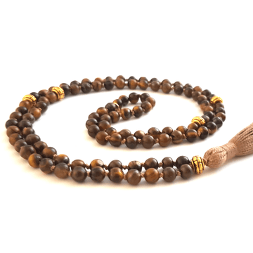 Handmade Tigers Eye Solar Plexus Mala Necklace curled on table